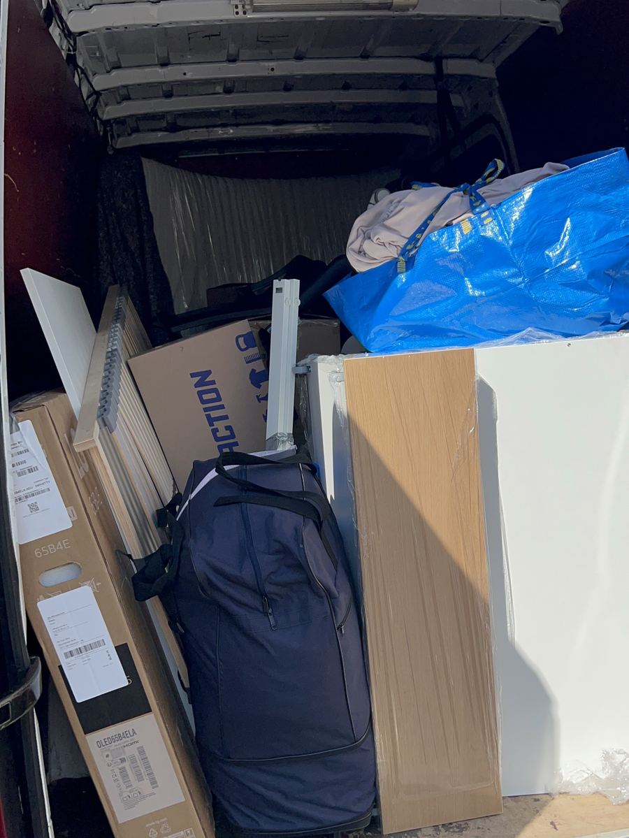 Loaded van with furniture and boxes